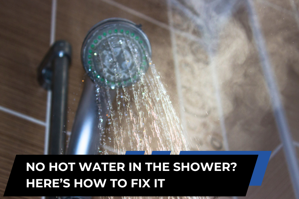 Shower head running water with steam, illustrating how to troubleshoot and fix a lack of hot water in the shower.
