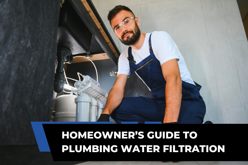 Plumber working beside an under-sink water filtration system in a residential kitchen.